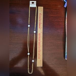 Franchesca's extra long gold-tone and "pearl" double chain.